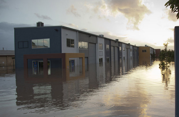 An apartment building flooded to the first floor.